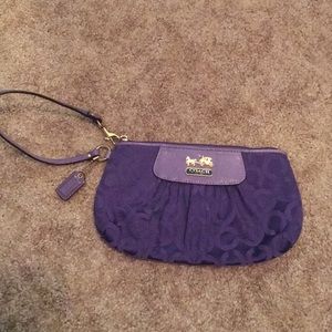 Purple Coach wristlet